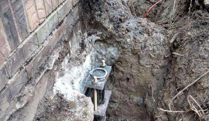 Foundation push pier installation